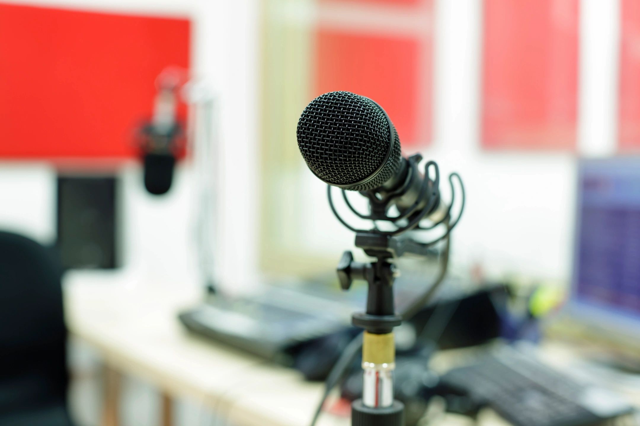 A microphone is set up in front of some other microphones.